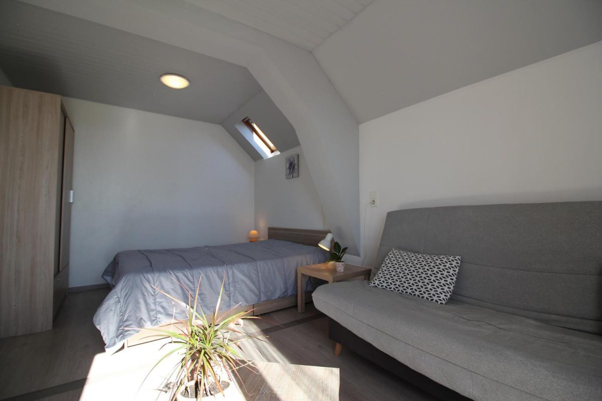 Chambre double et coin salon